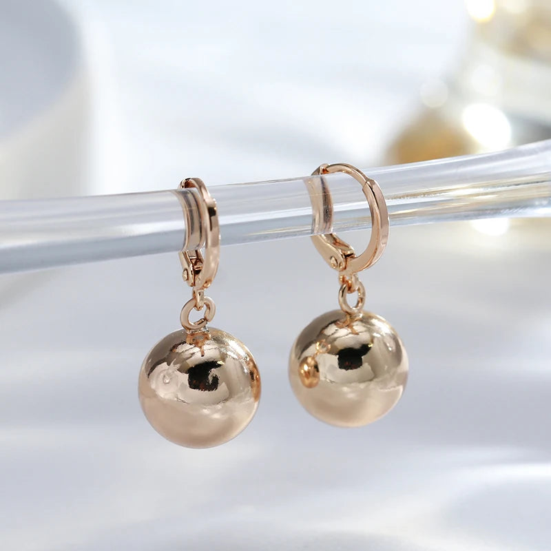 ✨ Glossy Spherical Drop Earrings – Modern Elegance in Rose Gold ✨