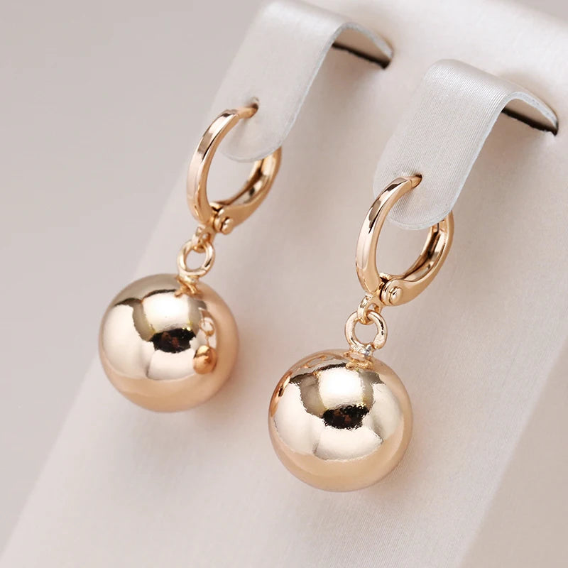 ✨ Glossy Spherical Drop Earrings – Modern Elegance in Rose Gold ✨